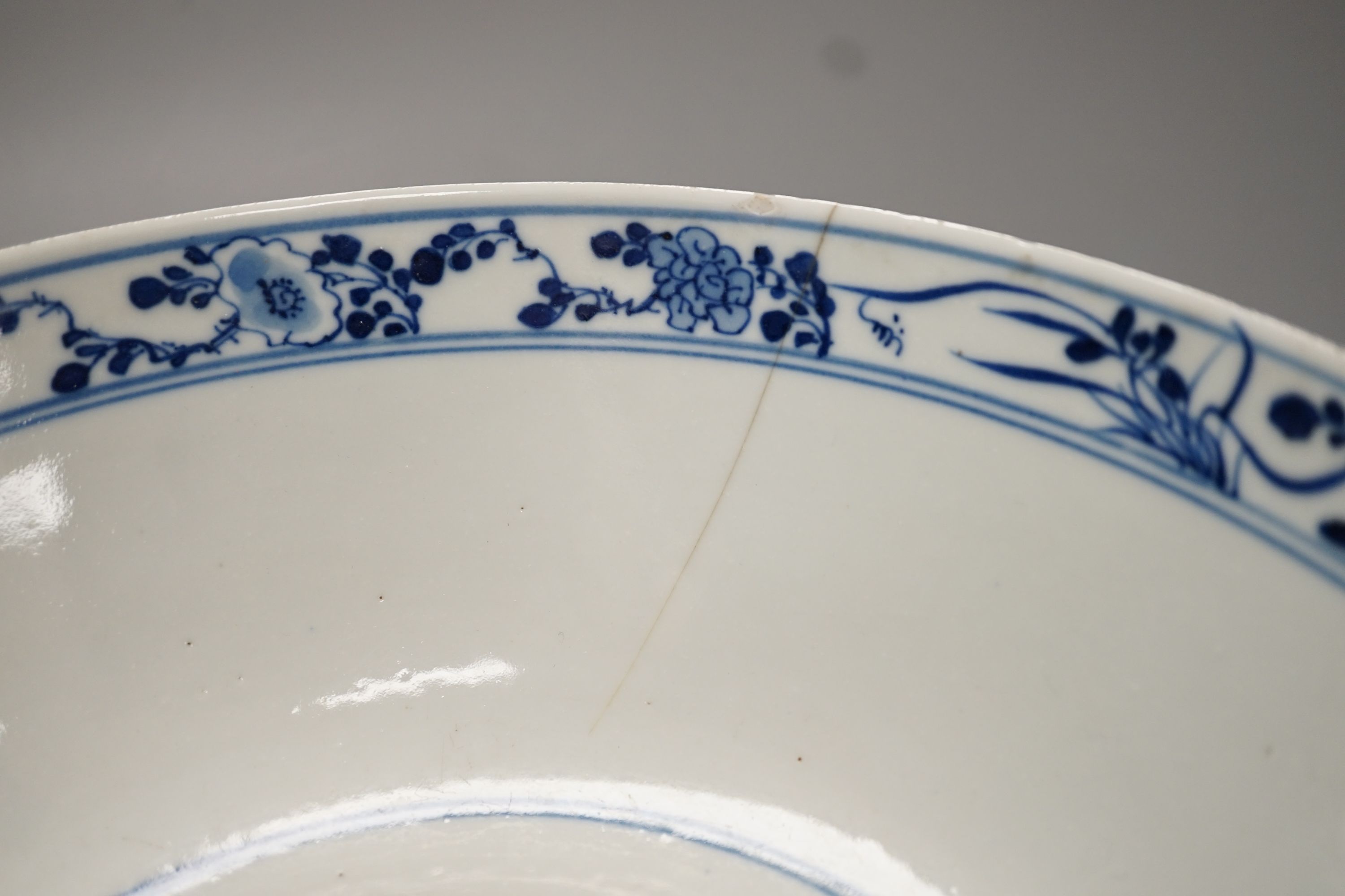 A 19th-century Chinese blue and white ‘dragon’ bowl - 27cm diameter